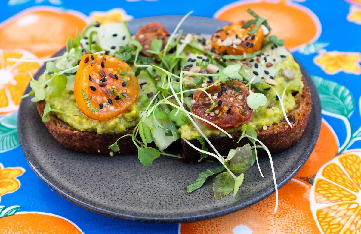 Behold the Florida Aguqcate, multi-grain toast, Florida avocado, roasted tomato, cucumber and hemp seed mix.