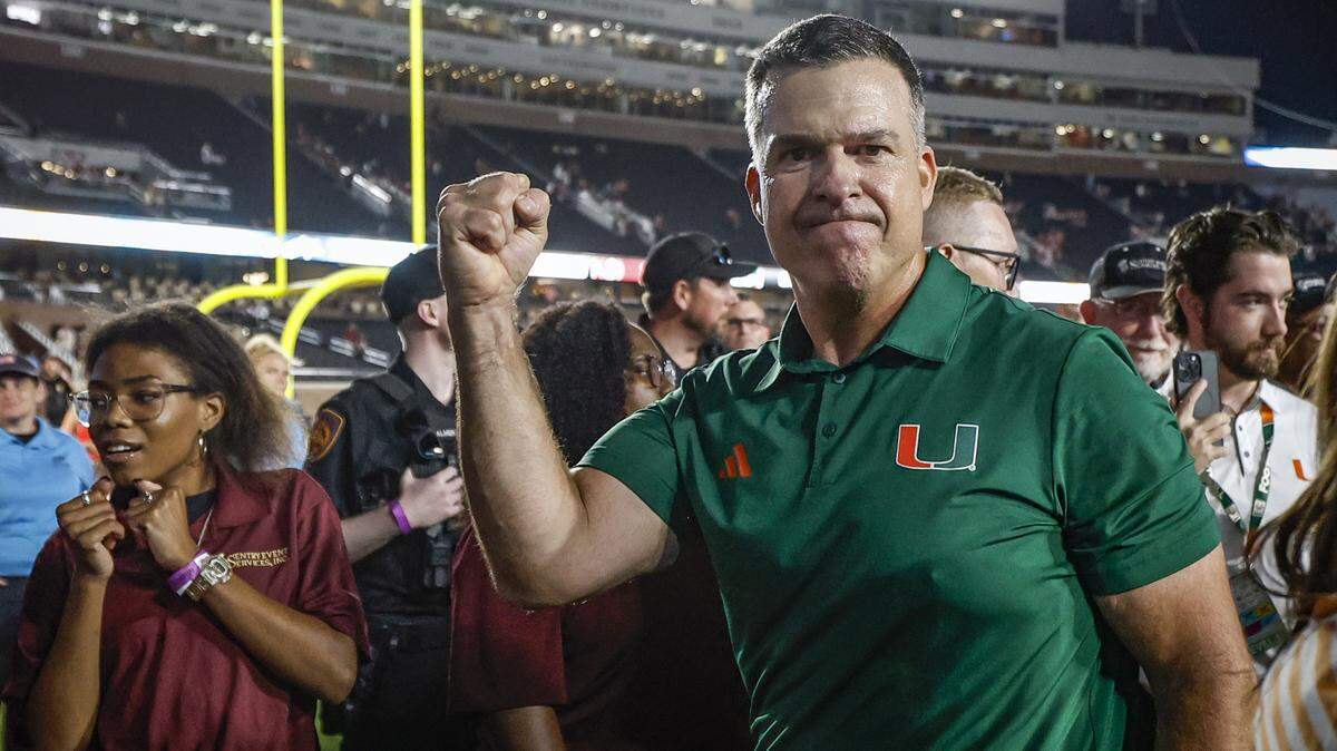 Miami Hurricanes head coach Mario Cristobal reacts after the Hurricanes defeat the Florida State Seminoles during their NCAA game at Doak Campbell Stadium in Tallahassee, Florida, on Saturday, October 4, 2025.