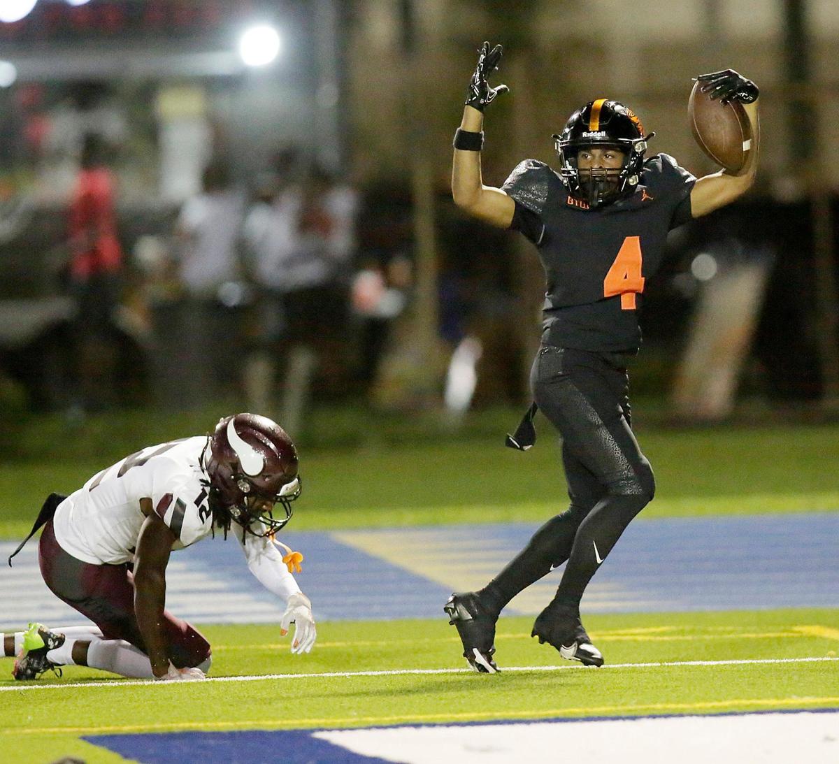 Booker T. Washington Tornadoes wide receiver Andre Brown Jr. (4) celebrates a touchdown against Norland Vikings during football game on Thursday, October 6, 2022 at Traz Powell Stadium in Miami. Andrew Uloza / for Miami Herald