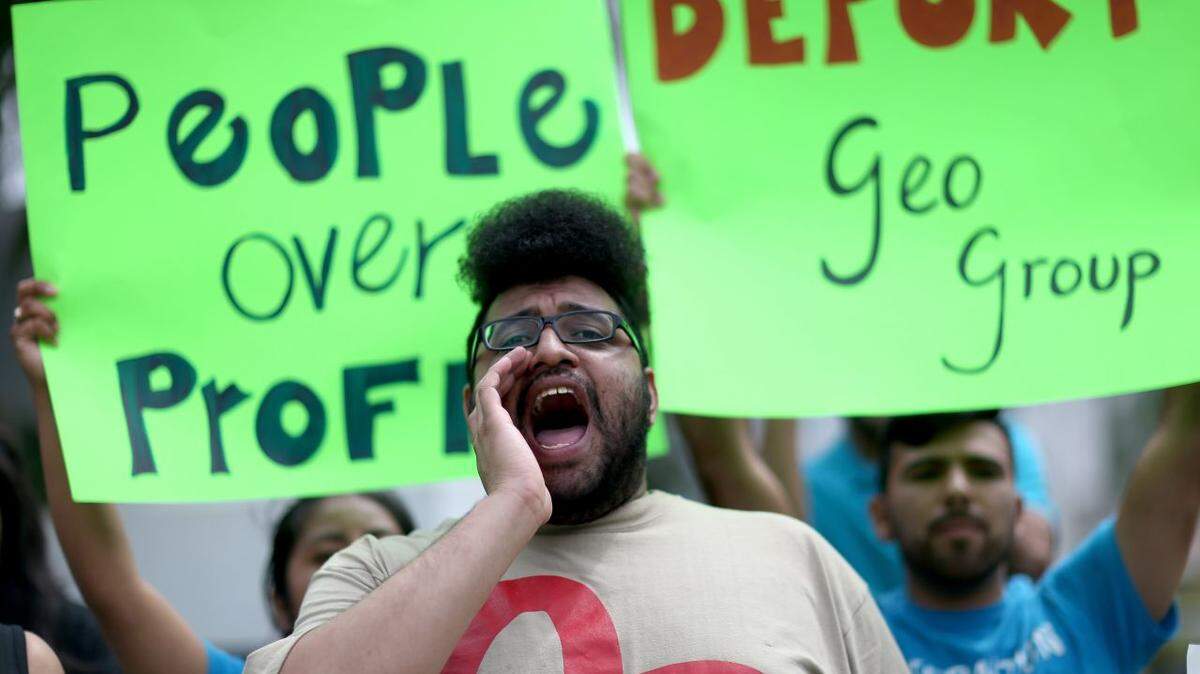 In 2016, Ruben Hayslette and other demonstrators gather in front of the GEO Group’s Boca Raton headquarters to protest the private prisons it manages across the country.