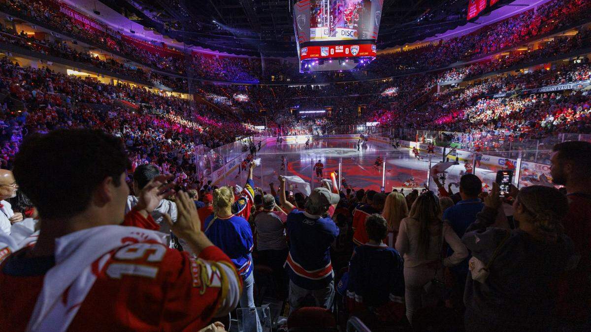 Fans cheer as Florida Panthers skate onto the ice before Game 4 of the Eastern Conference finals of the NHL hockey Stanley Cup playoffs against the New York Rangers at the Amerant Bank Arena on Tuesday, May 28, 2024, in Sunrise, Fla.