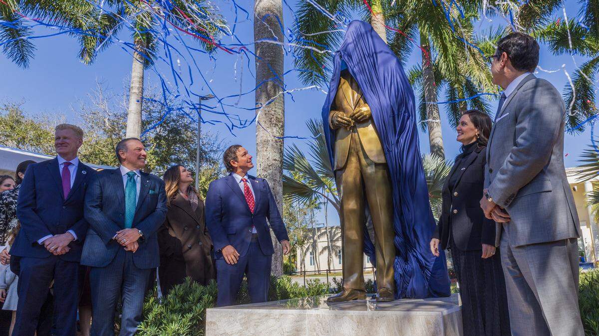 Attendees joined Florida International University President Jeanette Nuñez (right) and Florida’s Governor Ron DeSantis (center) during the unveiling ceremony of a statue of former President Ronald Reagan, by Cuban American artist Carlos Enrique Prado, marking what would have been his 115th birthday, on Feb. 6, 2026 
