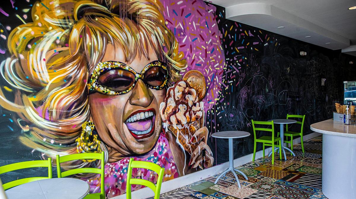A mural of Celia Cruz is on the wall at the new Azucar ice cream shop in Pinecrest.