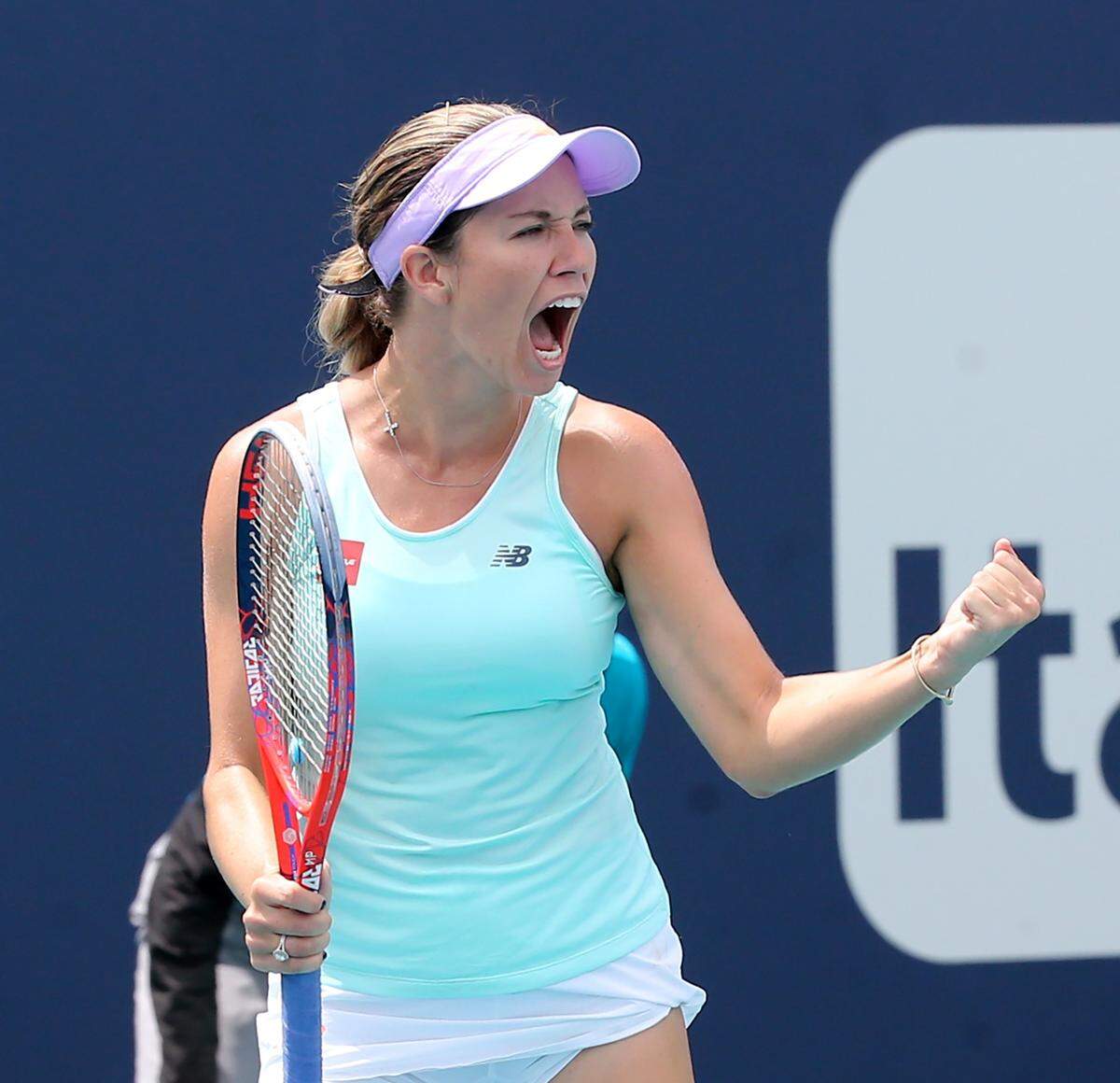 Danielle Collins reacts after scoring a point against Wang Yafan at the Miami Open in Miami Gardens, Florida, Sunday, March, 24, 2019.