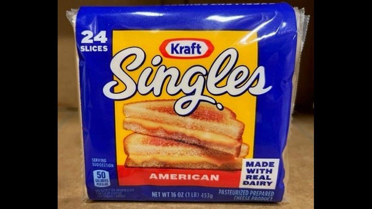 A 16-ounce pack of Kraft Singles American Pasteurized Prepared Cheese Product.