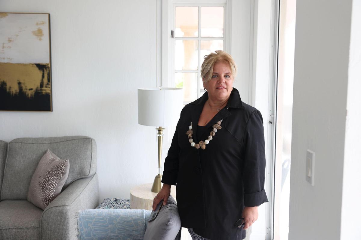Lourdes Castillo, co-founder of the Economic Club of Miami, poses in her Fisher Island home.