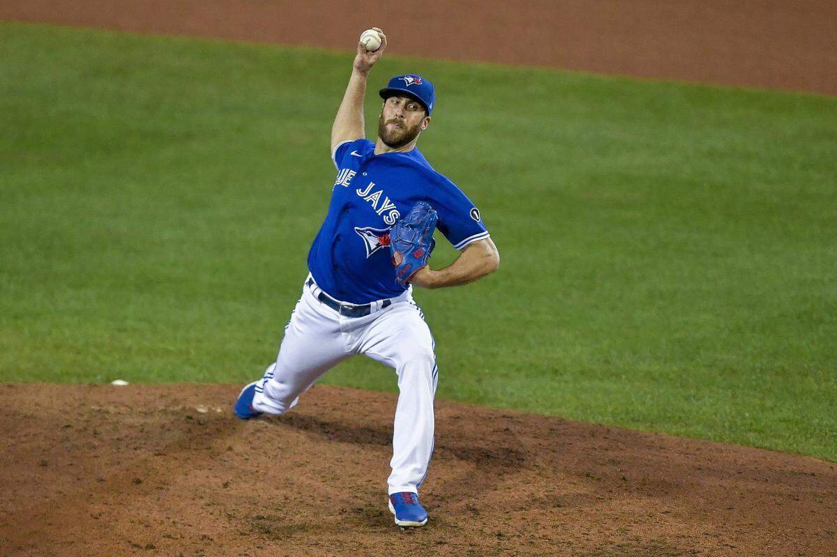Toronto Blue Jays pitcher Anthony Bass throws to a New York Yankees batter during the eighth inning of a baseball game in Buffalo, N.Y., Thursday, Sept. 24, 2020. (AP Photo/Adrian Kraus)