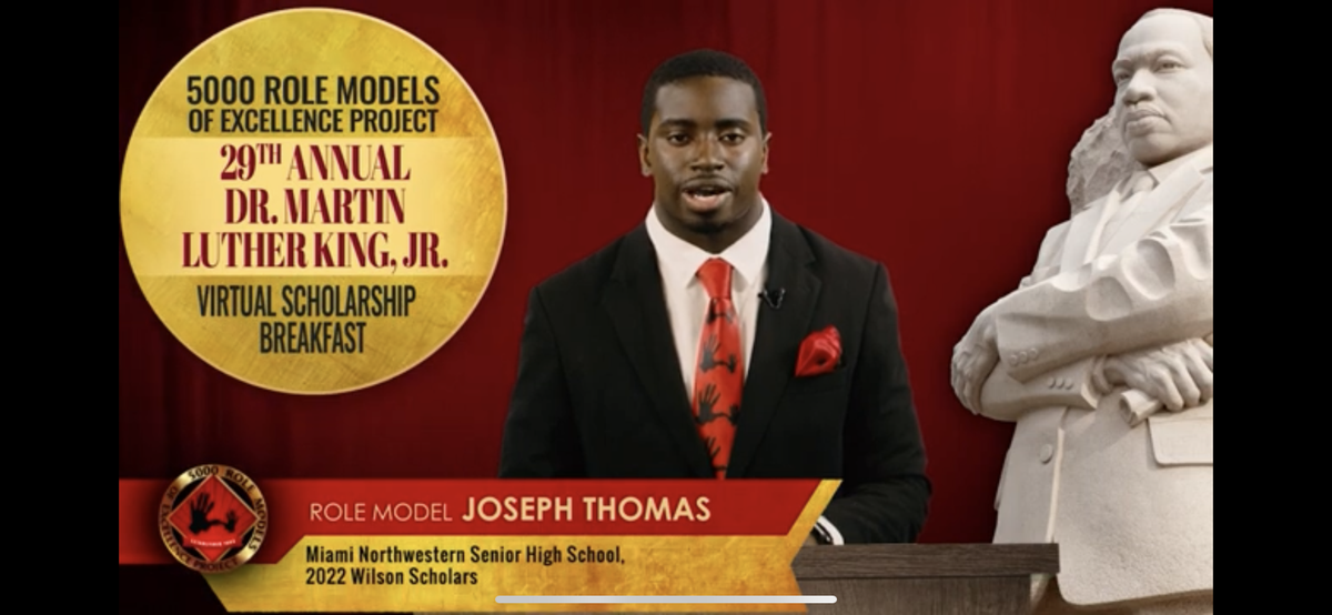 Miami Northwestern High School senior and Wilson Scholarship winner Joseph Thomas gives a tribute to outgoing Miami-Dade County Public Schools Superintendent Alberto Carvalho during Monday’s breakfast.