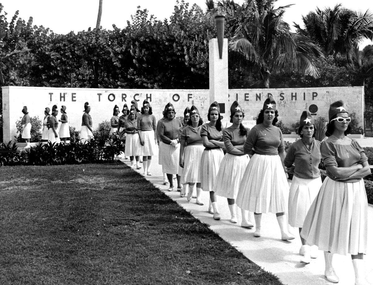 In 1961, Cuban exile women participate in the Hunger March around the Torch of Friendship, going without food or water in protest of Fidel Castro.