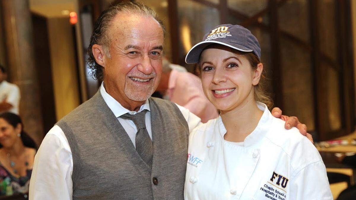 Badia Spices CEO Joseph Badia with Jenifer Bound, who received a Badia-funded scholarship by winning a spice competition with her Holy Smokes Pork & Meat Rub