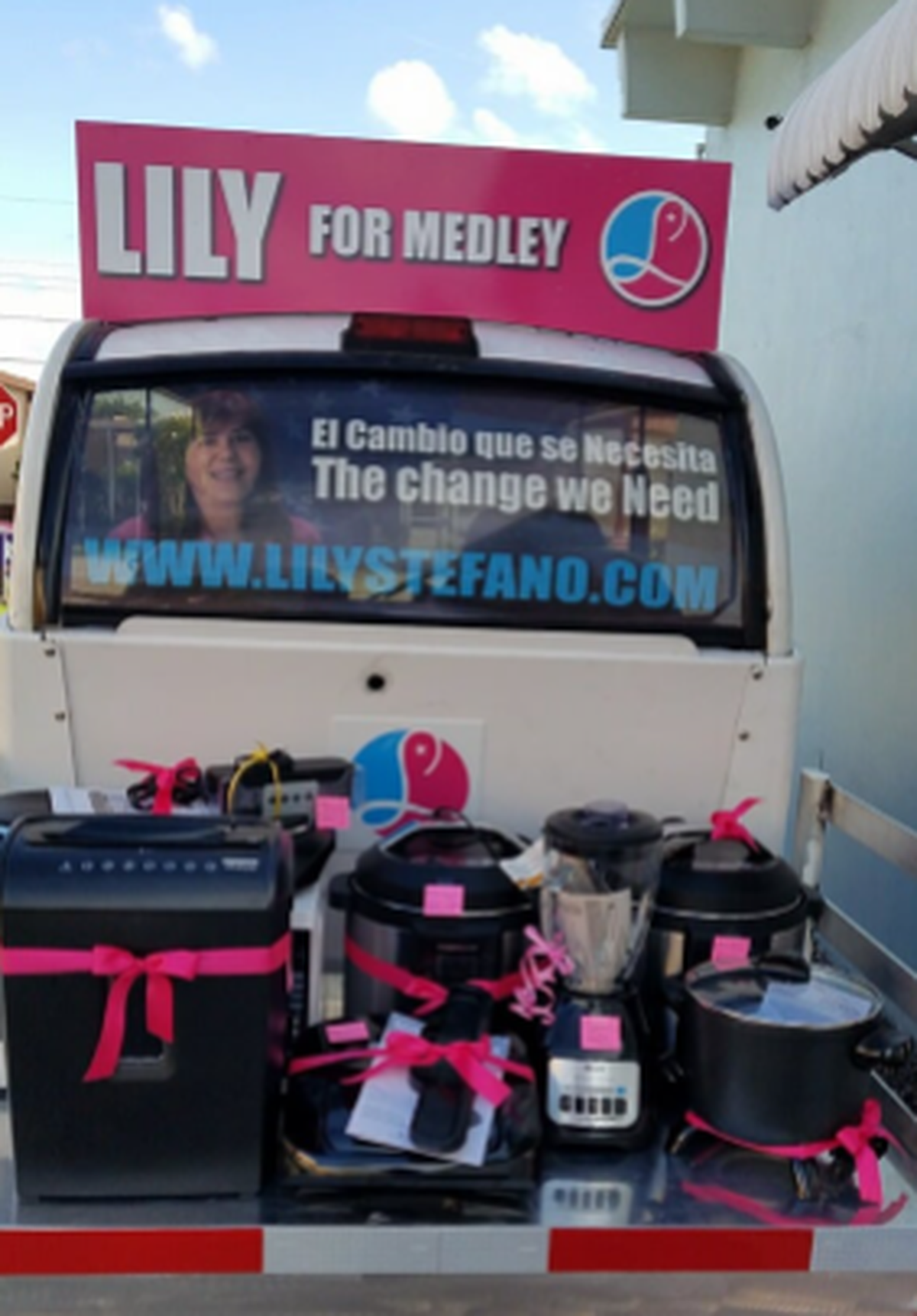 Medley Councilwoman Lily Stefano delivered gifts to residents on a golf cart adorned with her 2020 campaign information.