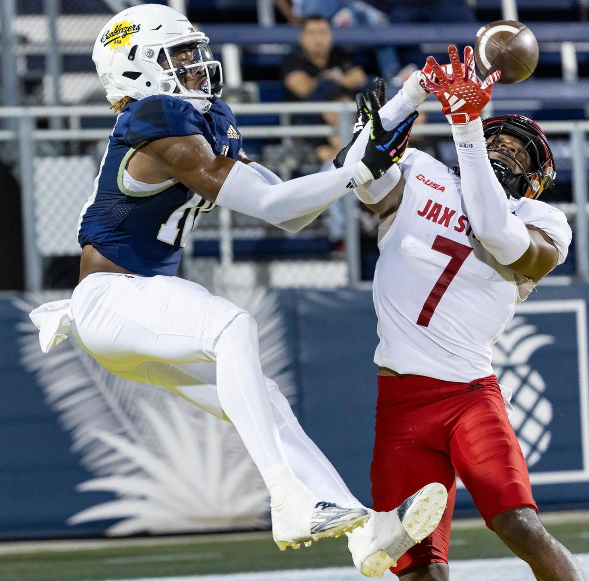 Jacksonville State cornerback Kekoura Tarnue (7) stops FIU Panthers wide receiver Kris Mitchell (10) from catching the ball in the first half of their NCAA DI football game at the FIU Football Stadium on Wednesday, Oct. 25, 2023, in Miami, Fla.