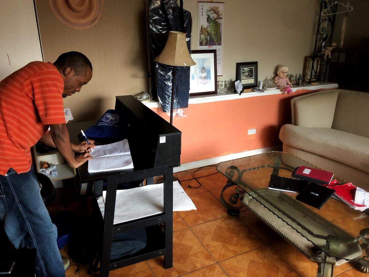 Remus Pierre writes everything down. His Grandmother’s living room is covered in notebooks, every page full, as he writes at his desk.