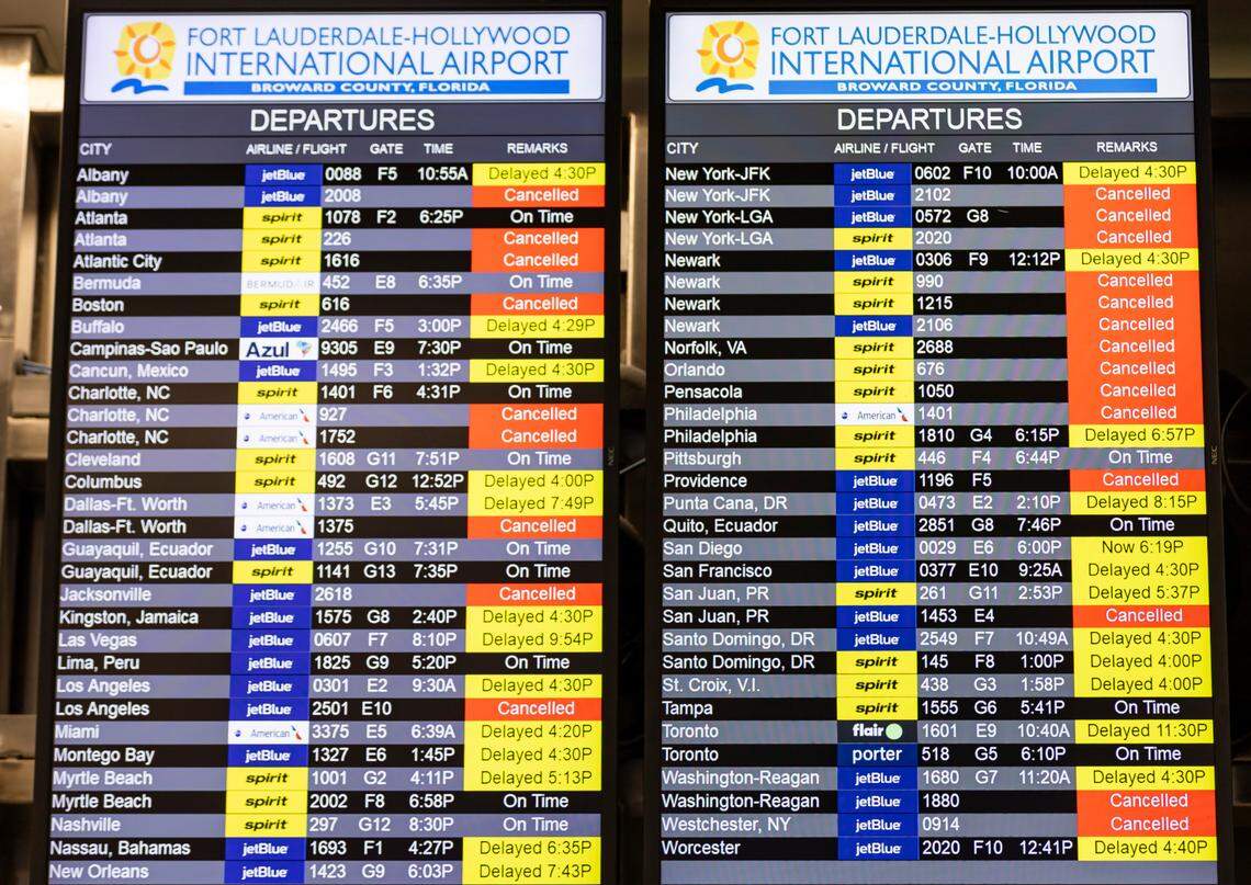 The flight board at Fort Lauderdale-Hollywood International Airport with delays due to rain and floodin gin 2024.