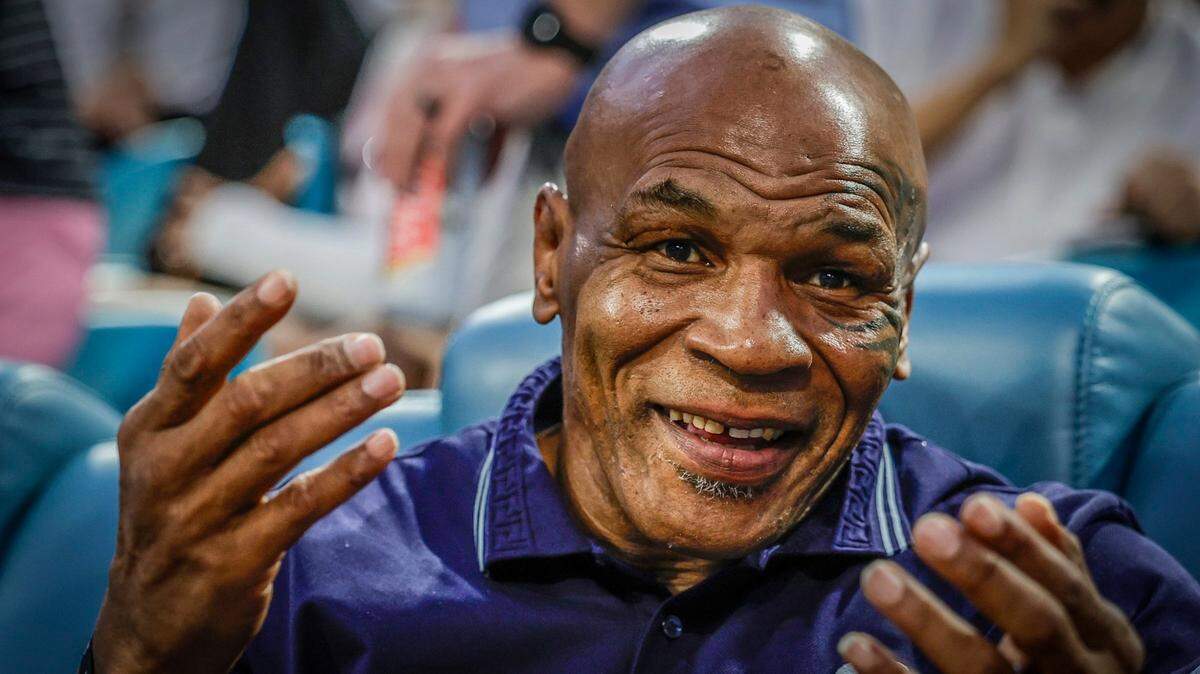 Mike Tyson reacts during the match between Carlos Alcaraz of Spain and Grigor Dimitrov of Bulgaria during the Miami Open Tennis Tournament at Hard Rock Stadium in Miami Gardens, Florida on Thursday, March 28, 2024.