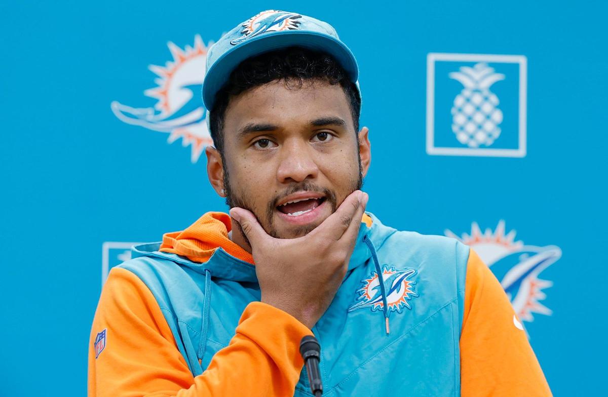 Miami Dolphins quarterback Tua Tagovailoa (1) speaks to reporters after practice at the Baptist Health Training Complex in Miami Gardens on Wednesday, October 4, 2023.