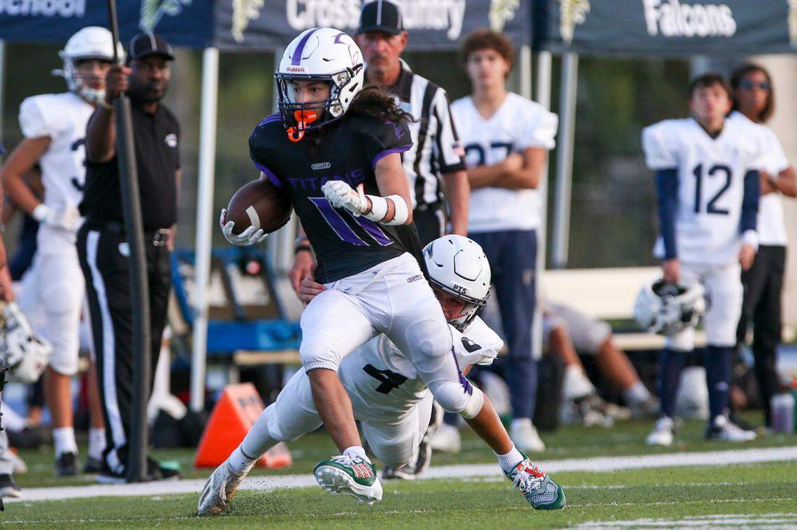 True North running back Owen Gomez (11) runs with the football during the third quarter of a high school football playoff game against Palmer Trinity at Tropical Park in Miami, Florida, Friday, November 25, 2022.