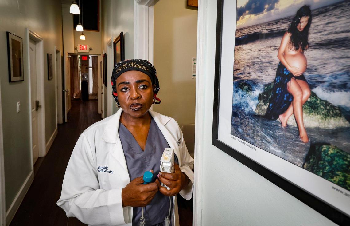 Dr. Christ-Ann Magloire walks through the hall at Serenity Holistic OB-GYN Research & Wellness Spa in North Miami Beach, Florida, on Friday, July 11, 2025. The Haitian American OB-GYN has helped hundreds of mothers give birth, many at North Shore Medical Center, a North Miami-Dade hospital that for decades provided medical care to the surrounding communities of Little Haiti, North Miami, Miami Shores and El Portal. But North Shore’s labor and delivery unit closed last year, part of its cost-cutting efforts shortly before its owners Steward Health Care System filed for bankruptcy. A year later, Magloire is still running her private practice but now must send her patients to other hospitals and is no longer able to deliver their babies.