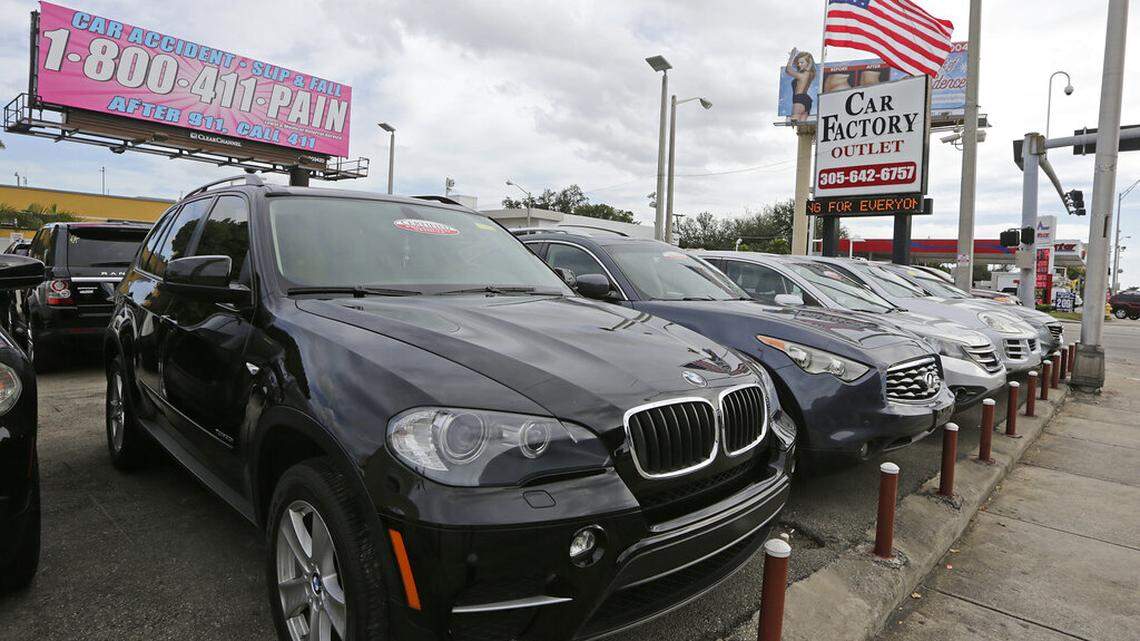 Certified pre-owned vehicles sit on display at an auto dealership in Miami. Used car shoppers have encountered sticker shock due to surging costs of the vehicles — and there is fear the spike in prices will continue.