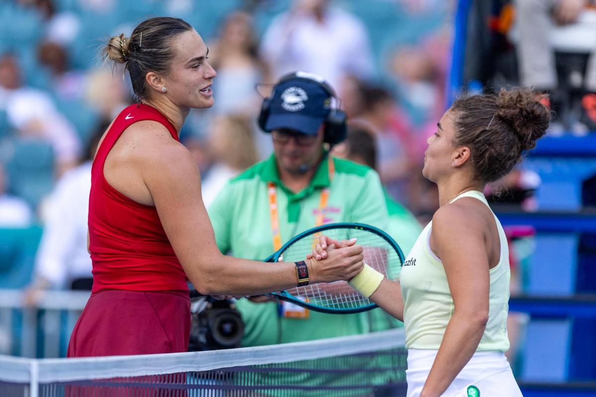 Aryna Sabalenka reacts with Jasmine Paolini after defeating her in two sets during the women’s semi final match at the Miami Open tennis tournament, held at Hard Rock Stadium on Thursday, March 27, 2025, in Miami Gardens, Florida.