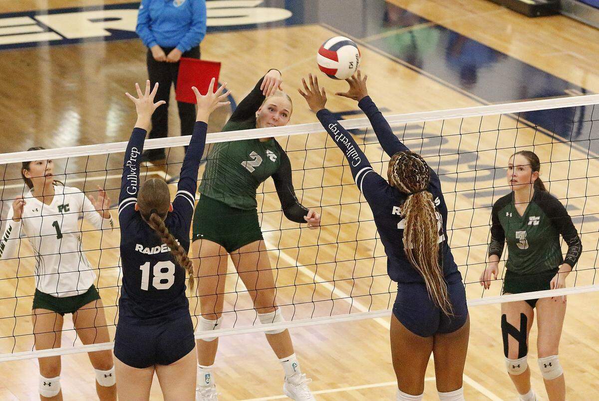 Pine Crest Panthers Elizabeth Sauby (2) spikes the ball against Gulliver Raiders during the Region 4-3A final volleyball game on Tuesday, October 28, 2025 at Gulliver Prep in Miami. Andrew Uloza / for Miami Herald