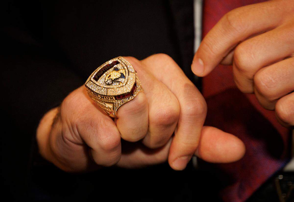Matthew Tkachuk points to his ring while speaking to the press after the Florida Panthers 2024 Champions Ring Ceremony on Monday, Oct. 7, 2024, at FTL War Memorial Auditorium in Fort Lauderdale, Fla.
