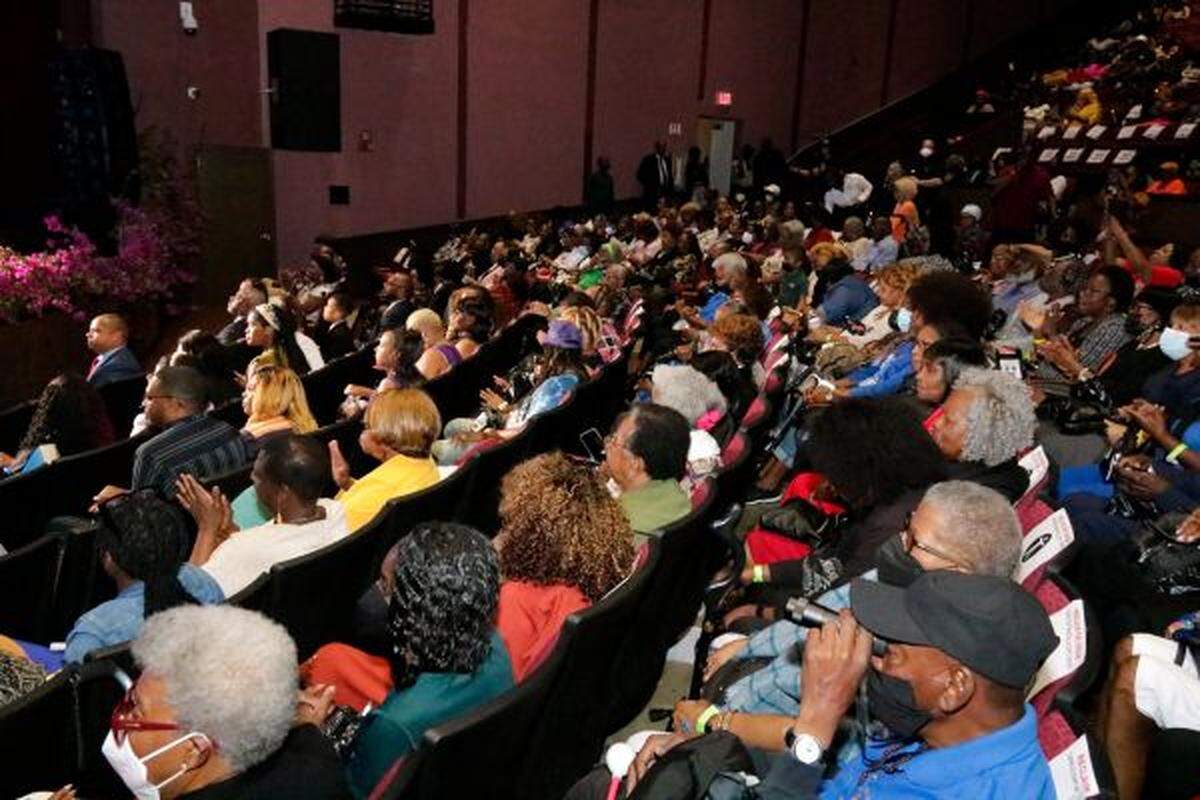 Crowds watch on at Reclaim the Dream Candlelight Memorial and Gospel Concert. The Liberty City nonprofit Martin Luther King Economic Development Corporation holds the event to commemorate Dr. King during the anniversary week of his assassination.