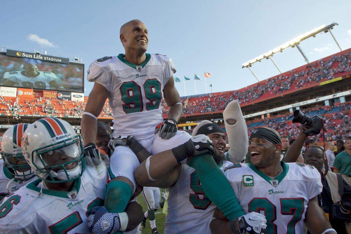 LInebacker Jason Taylor was all smiles as his teammates carried him off the field after a game with The Miami Dolphins and the New York Jets at the former Sun Life Stadium in Miami Gardens on January 1, 2012.