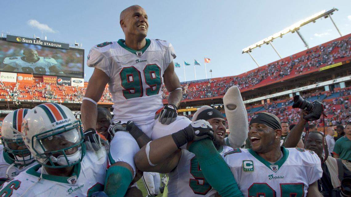 LInebacker Jason Taylor was all smiles as his teammates carried him off the field after a game with The Miami Dolphins and the New York Jets at the former Sun Life Stadium in Miami Gardens on January 1, 2012.