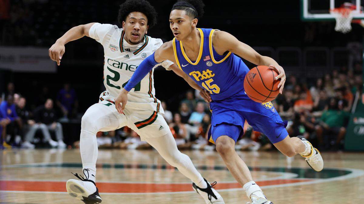 Pitt guard Jaland Lowe (15) drives to the basket past Miami Hurricanes guard Nijel Pack (24) at Watsco Center in January 2024. Lowe has deep ties to new UM coach Jai Lucas. Mandatory Credit: Sam Navarro-USA TODAY Sports
