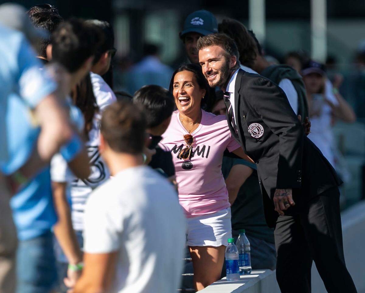 Inter Miami co-owner David Beckham takes a photo with fans after the conclusion of his team’s MLS soccer match against New York City FC at DRV PNK Stadium on Saturday, Oct. 30, 2021, in Fort Lauderdale, Florida. Inter Miami lost 3 to 1.