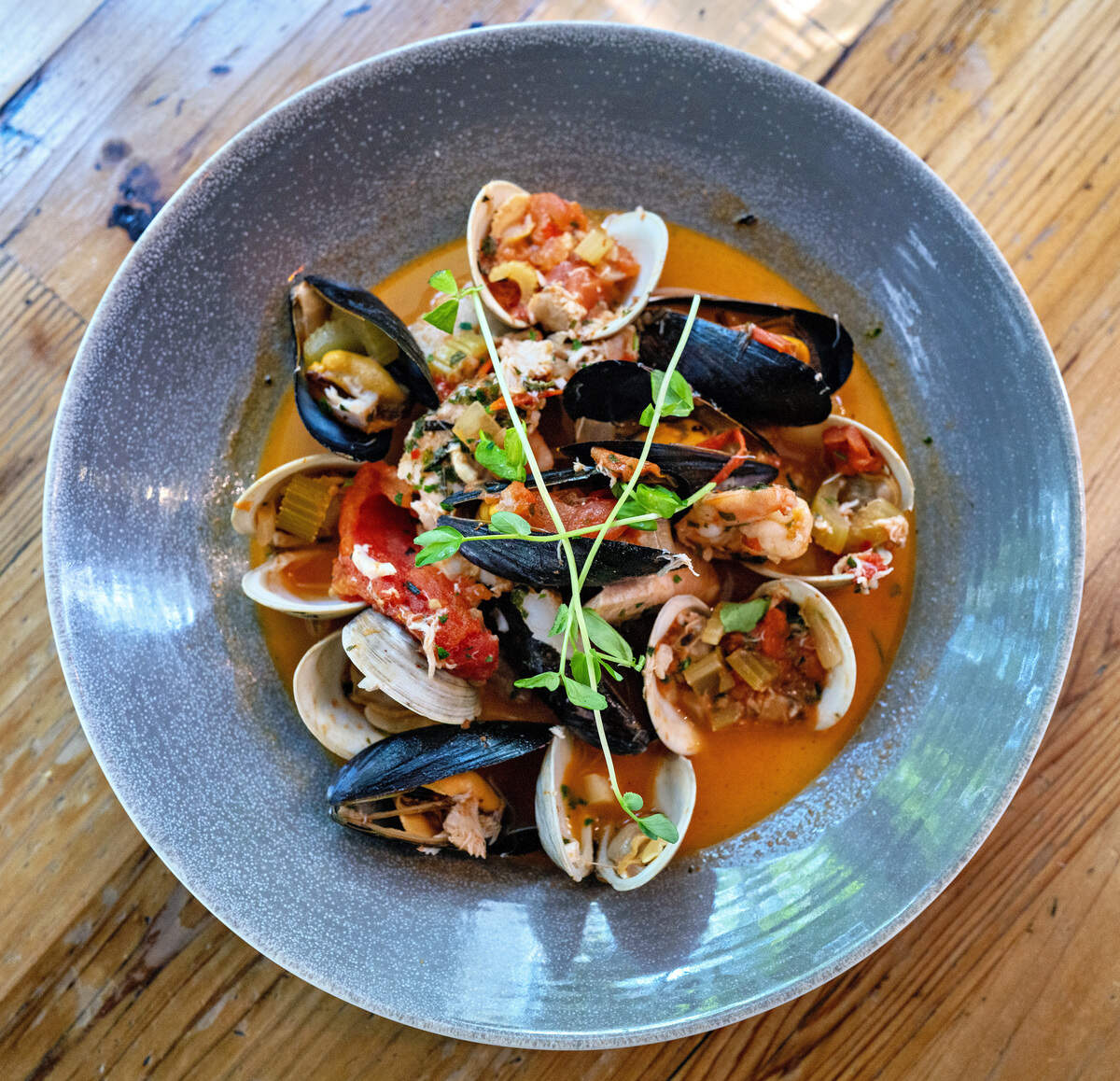 A seafood stew of mussels, clams, shrimp and crab in a tomato broth at Moondog Café & Bakery in Key West, which was named a Michelin Bib Gourmand.