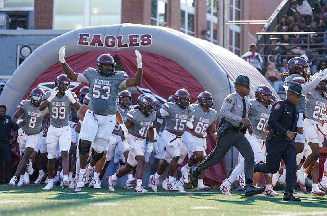 DURHAM, NORTH CAROLINA - AUGUST 30: Offensive lineman Ja'Quan Sprinkle #53 and other members of the North Carolina Central University Eagles enter the field prior to the start of their game against the University of New Hampshire Wildcats at O'Kelly-Riddick Stadium on August 30, 2025 in Durham, North Carolina. (Photo by Alex Halloway/Getty Images)