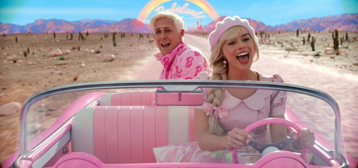 Ryan Gosling as Ken and Margot Robbie as Barbie in Warner Bros. Pictures’ “Barbie” leave Barbieland to find the real world. A famous scientist has told his millions of followers he’s figured out the location of Barbieland.