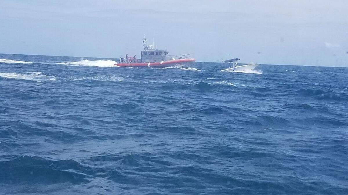 A Coast Guard Station Sand Key 45-foot response boat crew assisted three people aboard a 22-foot boat six miles west of Clearwater Pass, Florida, on Saturday, April 13, 2019. The Sand Key boat crew used a dewatering pump aboard the 22-foot boat, Snow Plow, after the boat started taking on water.
