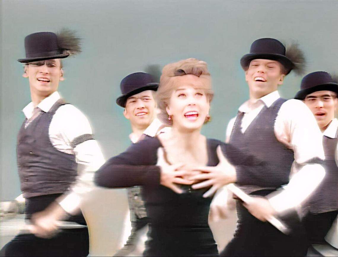 Michael Vita, right, with Gwen Verdon and dancers from “Sweet Charity” performing on the “Ed Sullivan Show” in 1966.