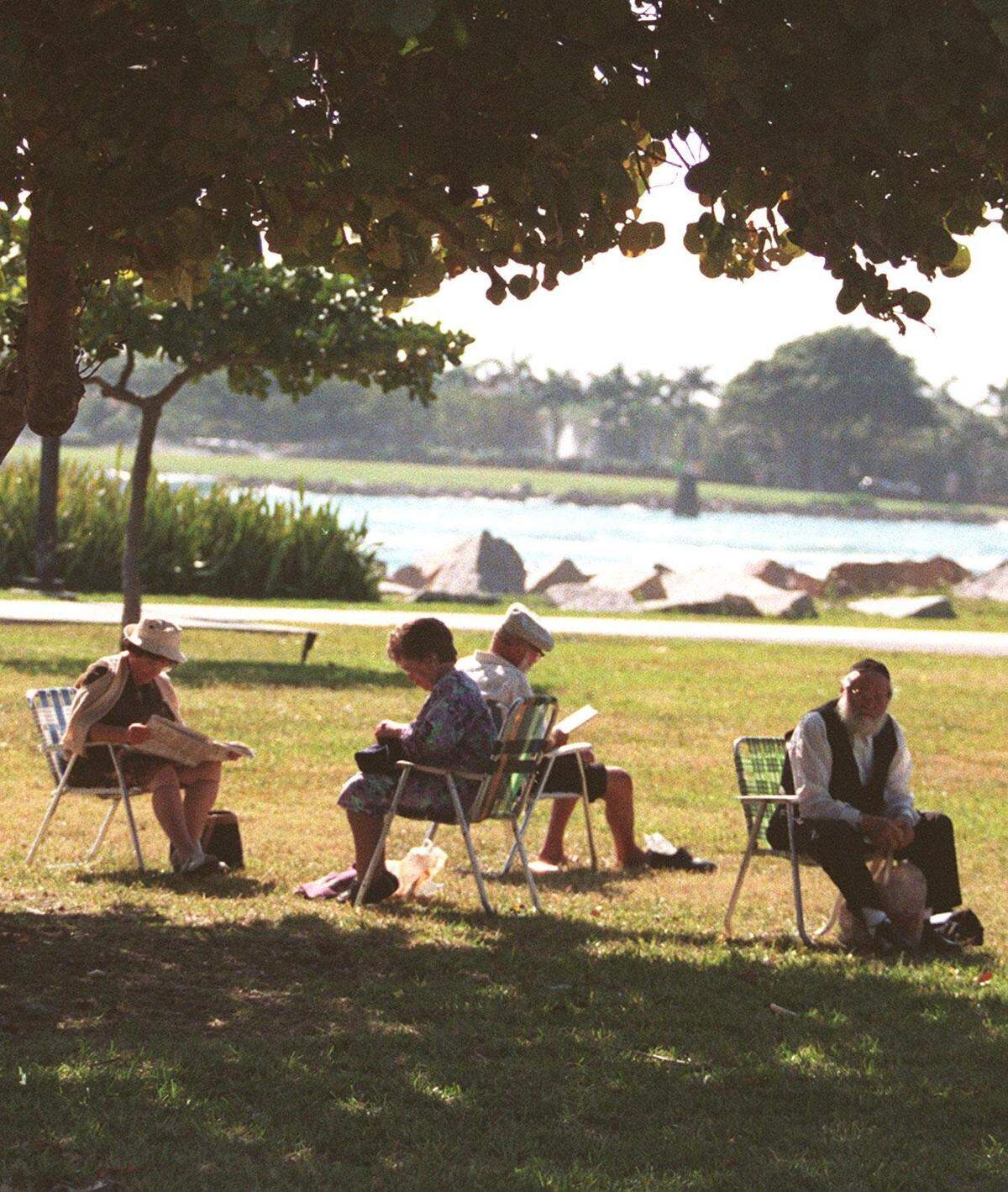 Senior citizens gather at South Pointe Park in Miami Beach.