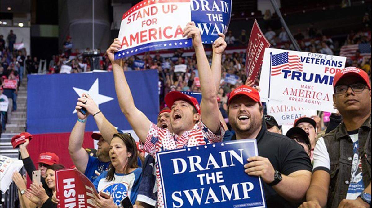 Trump voters show their support for the president at rally in Texas.