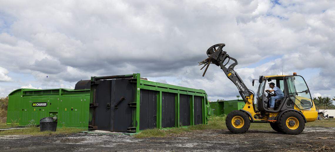 James Hilliard, a mechanical designer with Air Burners, uses an electric compact wheel loader to shift wood waste on Thursday, Jan. 8, 2026, in Palm City, Fla. Air Burners is a manufacturer of air curtain burner systems, which provide a controlled way to dispose of wood and other vegetative waste.