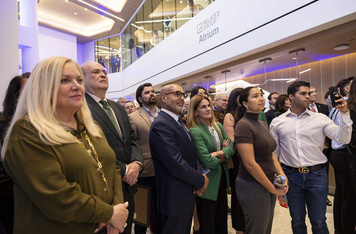 David Zambrana, center, Jackson Health System’s president and chief operating officer and incoming CEO, attends a preview event of a new emergency room at Jackson Memorial Hospital on Thursday, April 16, 2026, in Miami, Fla.