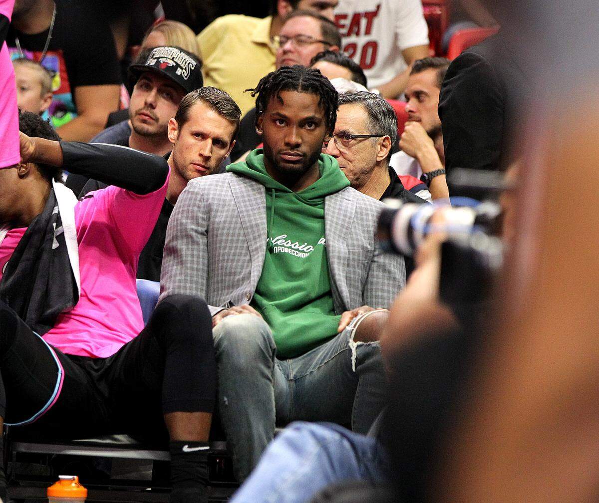 Heat forward Justise Winslow at the bench during the first quarter of the Miami Heat vs Houston Rockets at AmericanAirlines Arena in Miami on Thursday, December 20, 2018.