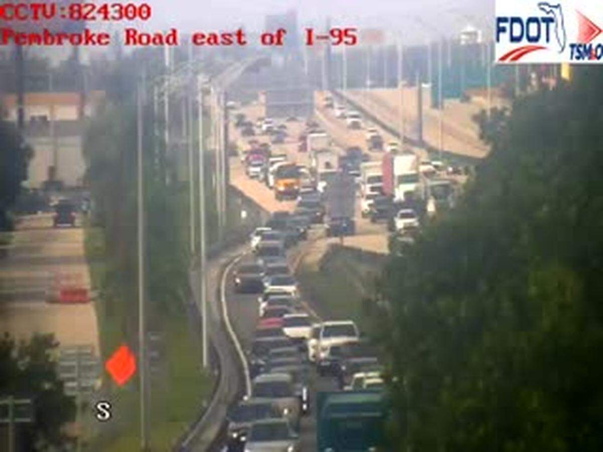 Wednesday rush hour traffic on Interstate 95 south gets off at Pembroke Road, where all lanes were shut down after a crash ended a police chase.