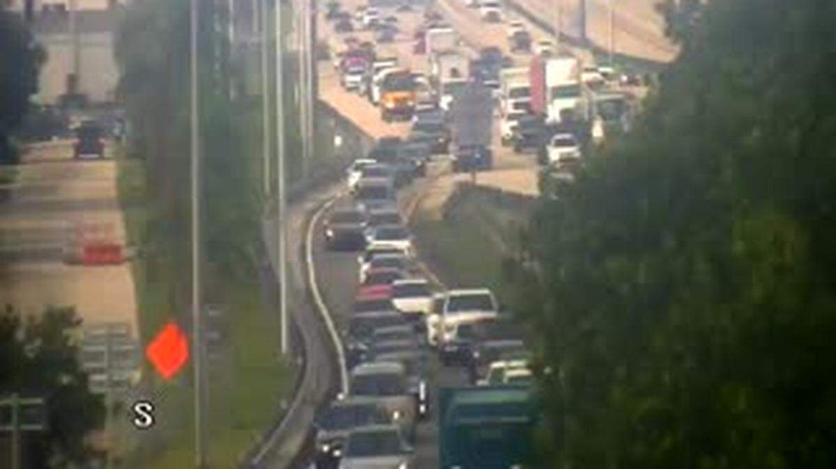 Wednesday rush hour traffic on Interstate 95 south gets off at Pembroke Road, where all lanes were shut down after a crash ended a police chase.
