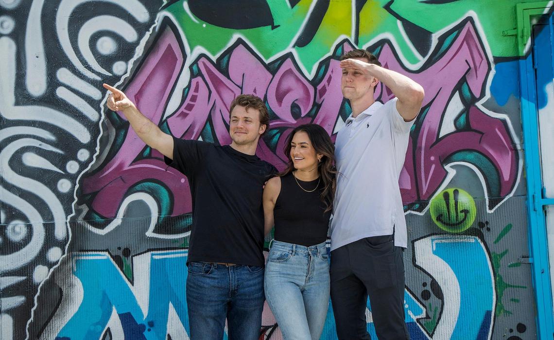 Rella social media management app founder Natalie Barbu is flanked by Nick Kane, right, chief operating officer, and Connor Boyce, chief technology officer, in Wynwood on Wednesday, April, 20, 2022.