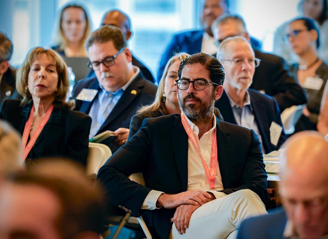 David Martin, CEO of Terra, listens to speakers during the Miami Leadership Local conference at Bilzen Sumberg in Miami on Friday, October 27, 2023.