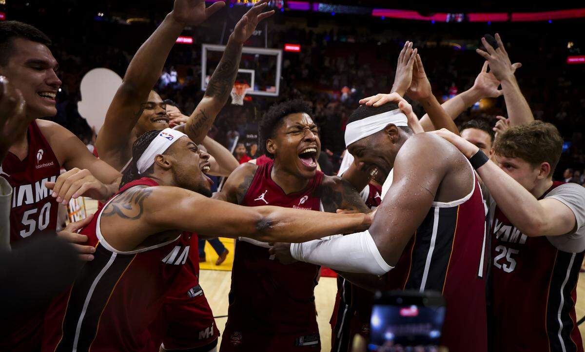Miami Heat center Bam Adebayo (13)celebrates with teammates after he scored 83 points against the Washington Wizards, marking the second-highest single-game point total in NBA history, on Tuesday, March 10, 2026, at Kaseya Center in downtown Miami, Fla. The Miami Heat won 150-129.