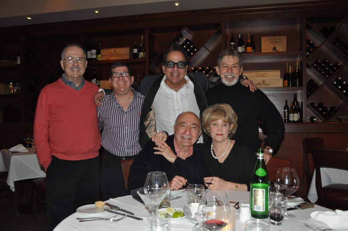 Friends celebrate New Year's Eve 2011 in Coral Gables, clockwise from left: public affairs executive Ric Katz; his husband, Miami Herald journalist Steve Rothaus; director Richard Jay-Alexander; attorney Jim Casey: his wife, retired Miami Herald columnist Joan Fleischman and Charlie Cinnamon.