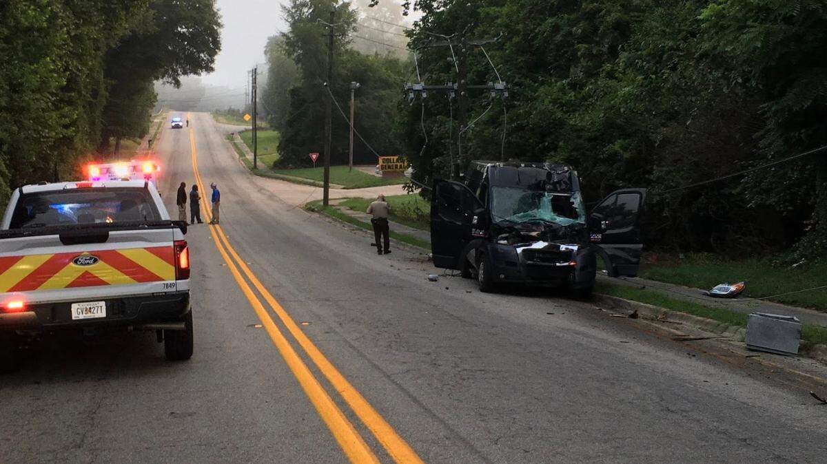 The driver of an inmate transport van fell asleep at the wheel and crashed in Sparta, Georgia, state troopers said.