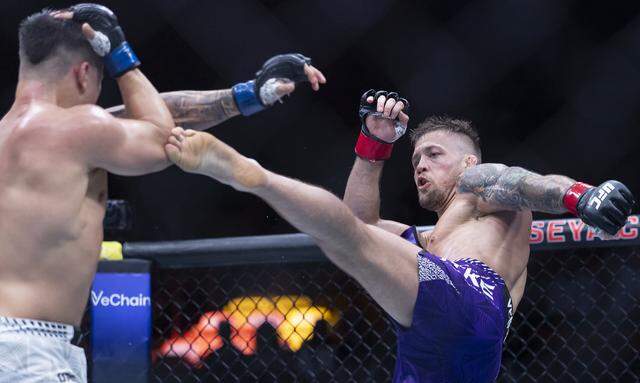 Charles Radtke of the United States and Francisco Prado of Argentina fight in their welterweight bout at UFC 327 at the Kaseya Center on Saturday, April 11, 2026, in downtown Miami, Fla.