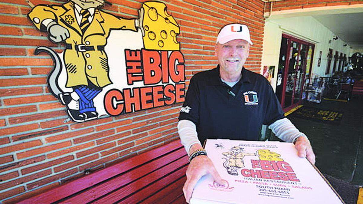 The Big Cheese co-founder Bill Archer with one of his pizzas at the front of his restaurant in an undated photo.